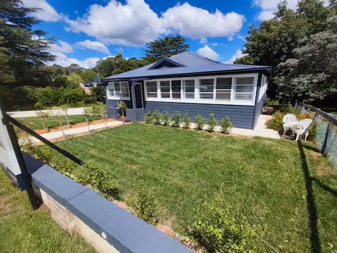 Tidied cottage lawn and garden in Jamberoo