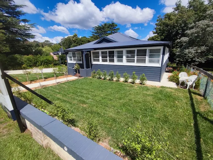Tidied cottage lawn and garden in Jamberoo